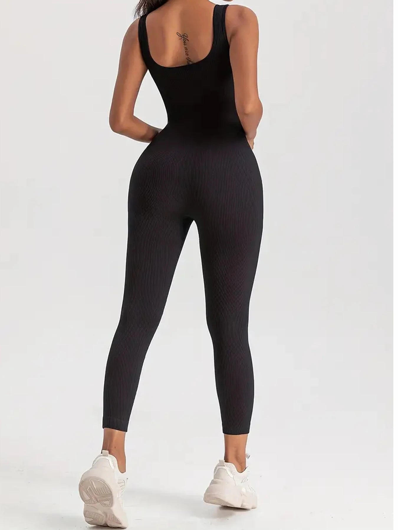 Elevate Your Workout with Our Solid Color Ribbed Yoga Jumpsuit - Seamless Slim Fit Long Sleeve Sports Bodysuit for Women